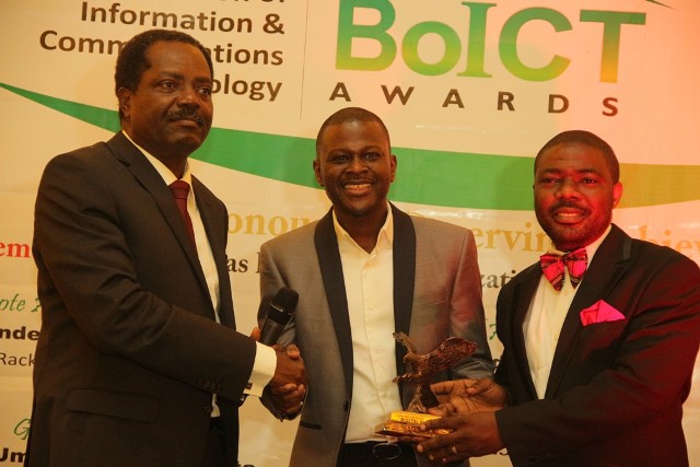 Mr Oluseyi Akindeinde (Middle) receiving the best cyber security company of the year award at the Beacon of Information and communication Technology Awards 