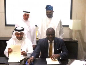 Lagos State photo release shows the signing of the Memorandum of Understanding for the Lagos Smart City that was on Monday signed at the Emirate Towers in Dubai by Mr. Adeniji Kazeem, Lagos State Attorney General and Commissioner of Justice (sitting left) and Mr. Jabber Bin Hafez, the Chief Executive Officer of Smart City Dubai LLC. Standing behind them is His Excellency, Ahmad Bin Byat, Chairman of Dubai Holdings, who is also the Deputy Prime Minister and Mr. Akinwunmi Ambode, Lagos State Governor.