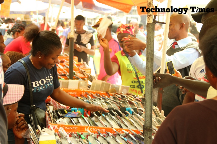 Technology Times file photo shows people seen buying and selling at Computer Village, Nigeria’s largest technology market.